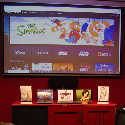 A photo of our cinema room. The programme menu is shown on the screen.